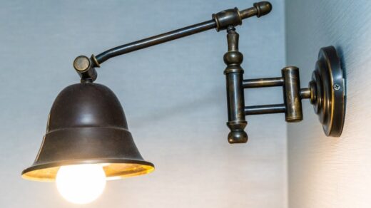 a beautiful vintage lamp mounted on the wall