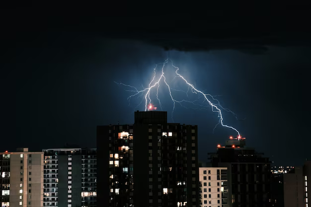 Lightning strikes the roofs of buildings