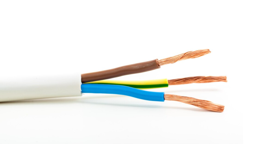 A close-up view of a white insulated cable revealing the exposed brown, blue, yellow, and green conductors