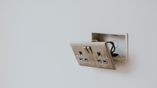Broken power outlet on the wall